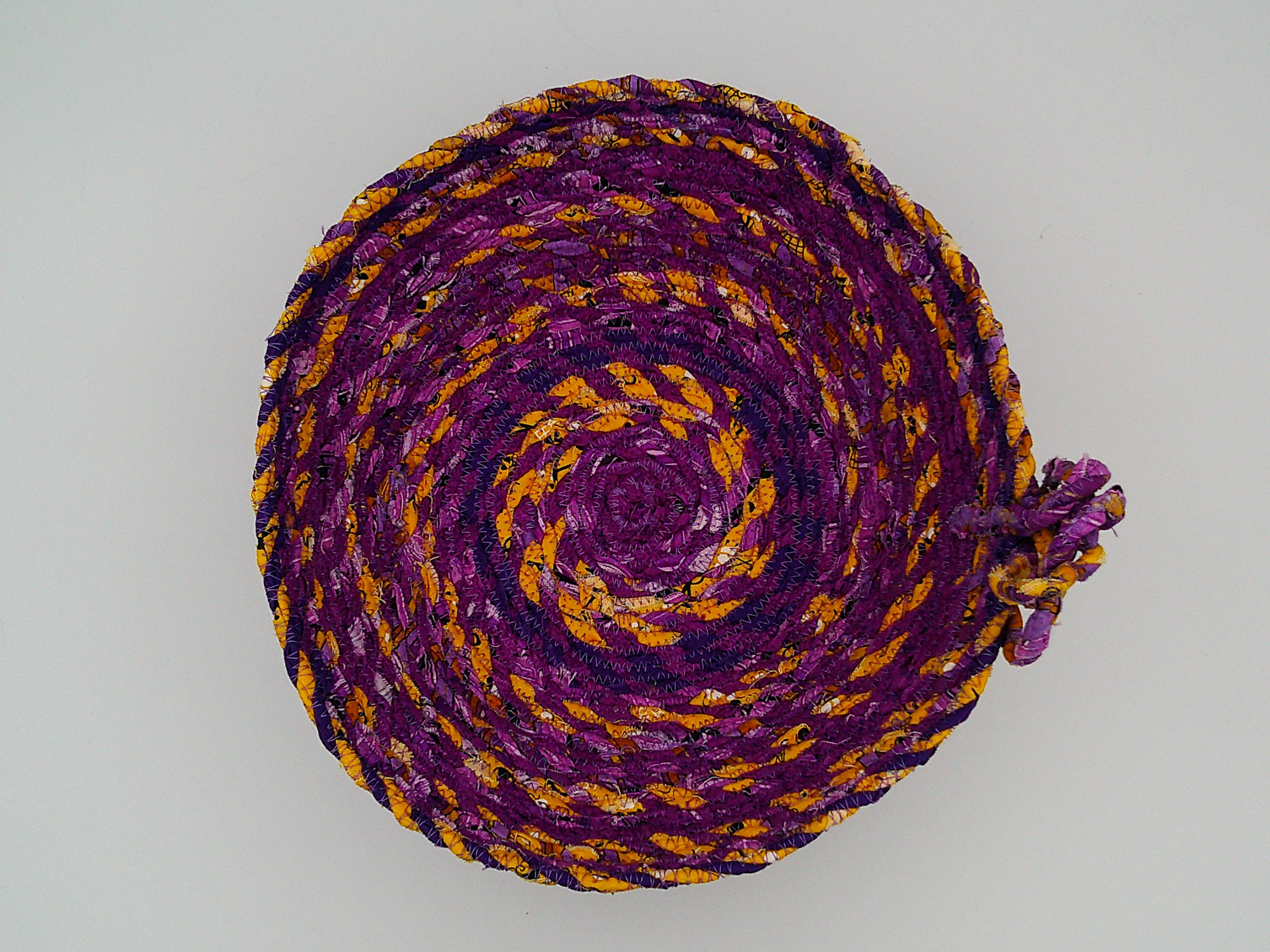 This is looking from the top down, to the inside of the bowl. It clearly shows how the colors make a unique design. This is looking from the top down, to the inside of the bowl. It clearly shows how the colors make a unique design.