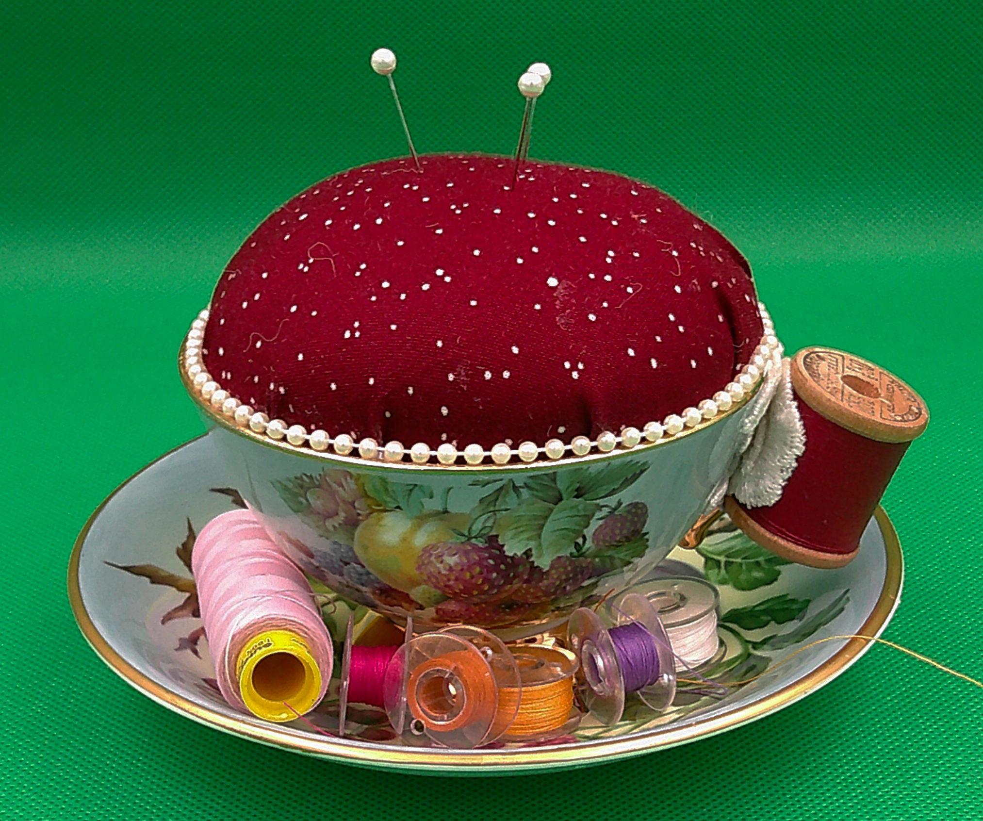 this is an example of how the bobbin holder can accommodate bobbins and thread. They are NOT included with the sale. this is an example of how the bobbin holder can accommodate bobbins and thread. They are NOT included with the sale.