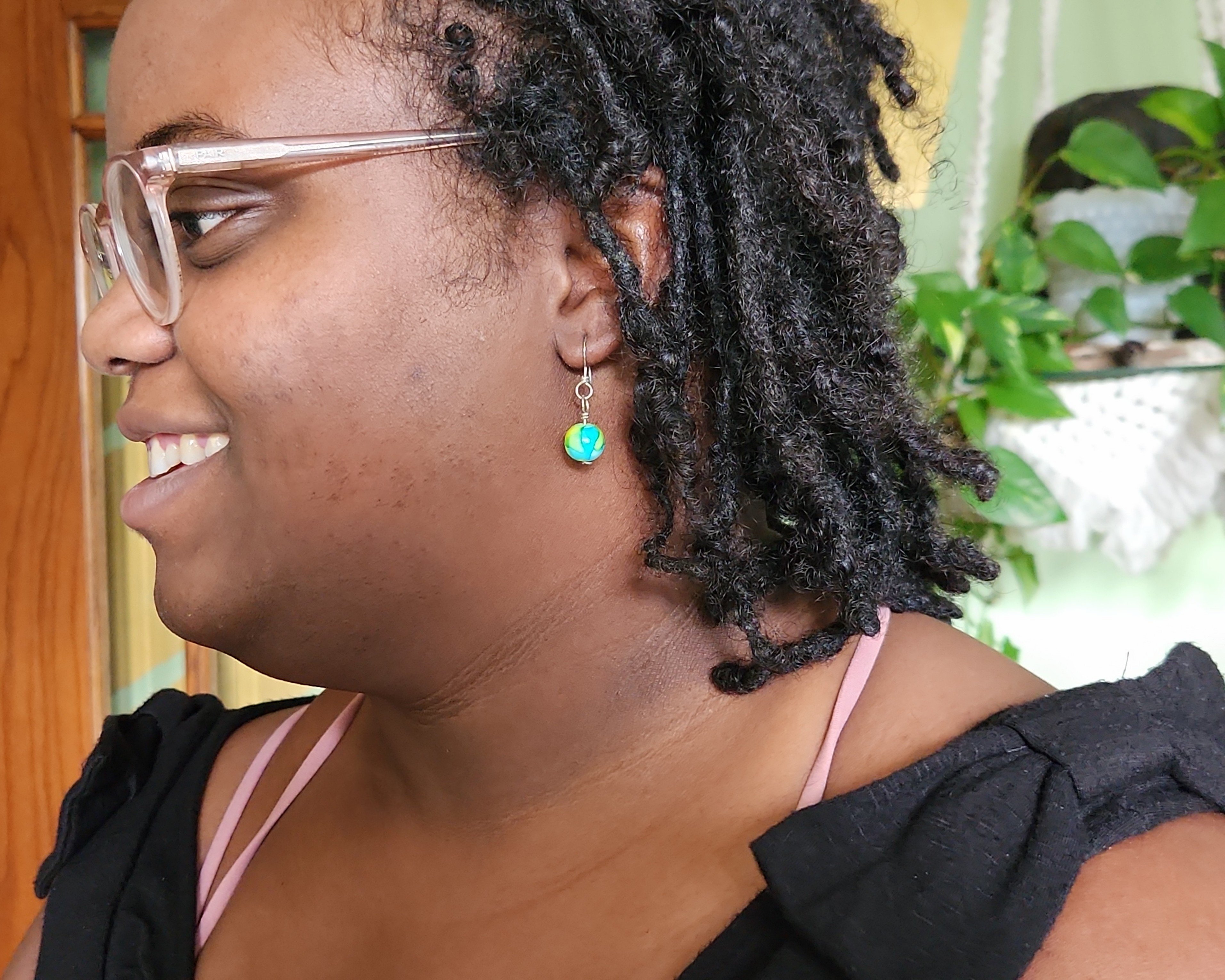 Earrings modeled by Vanessa Byrd. Earrings modeled by Vanessa Byrd.