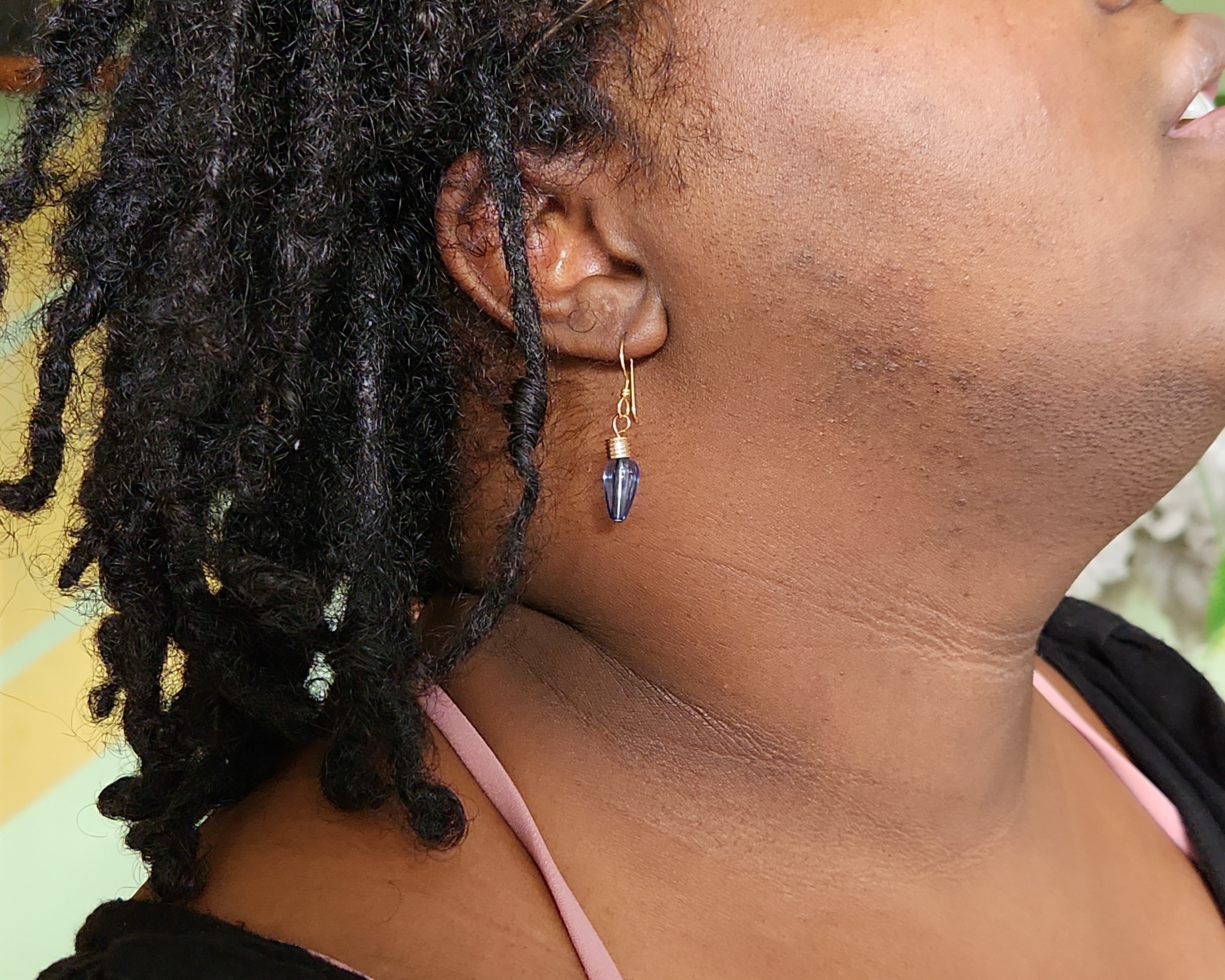 Earrings modeled by Vanessa Byrd. Earrings modeled by Vanessa Byrd.