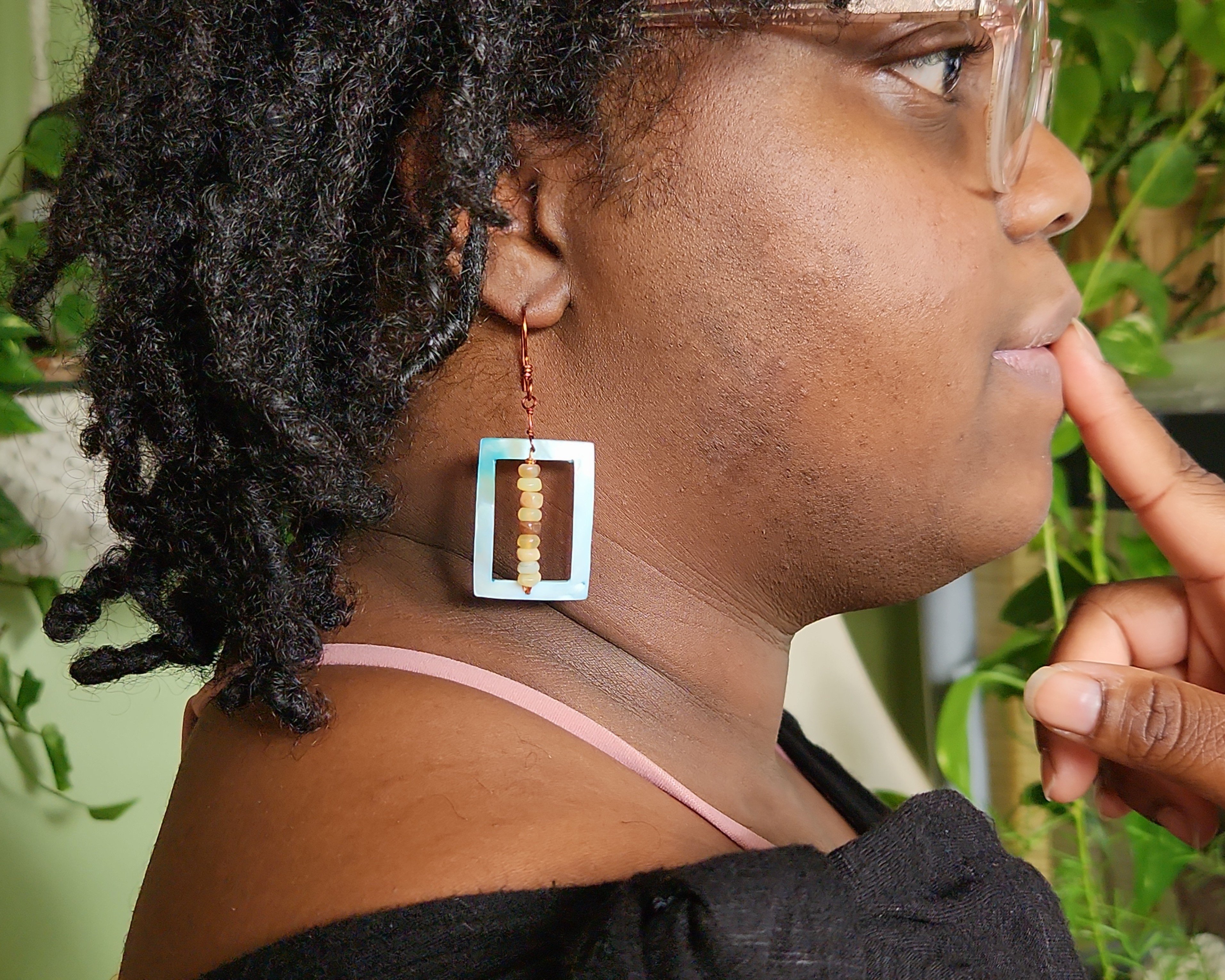 Earrings modeled by Vanessa Byrd. Earrings modeled by Vanessa Byrd.