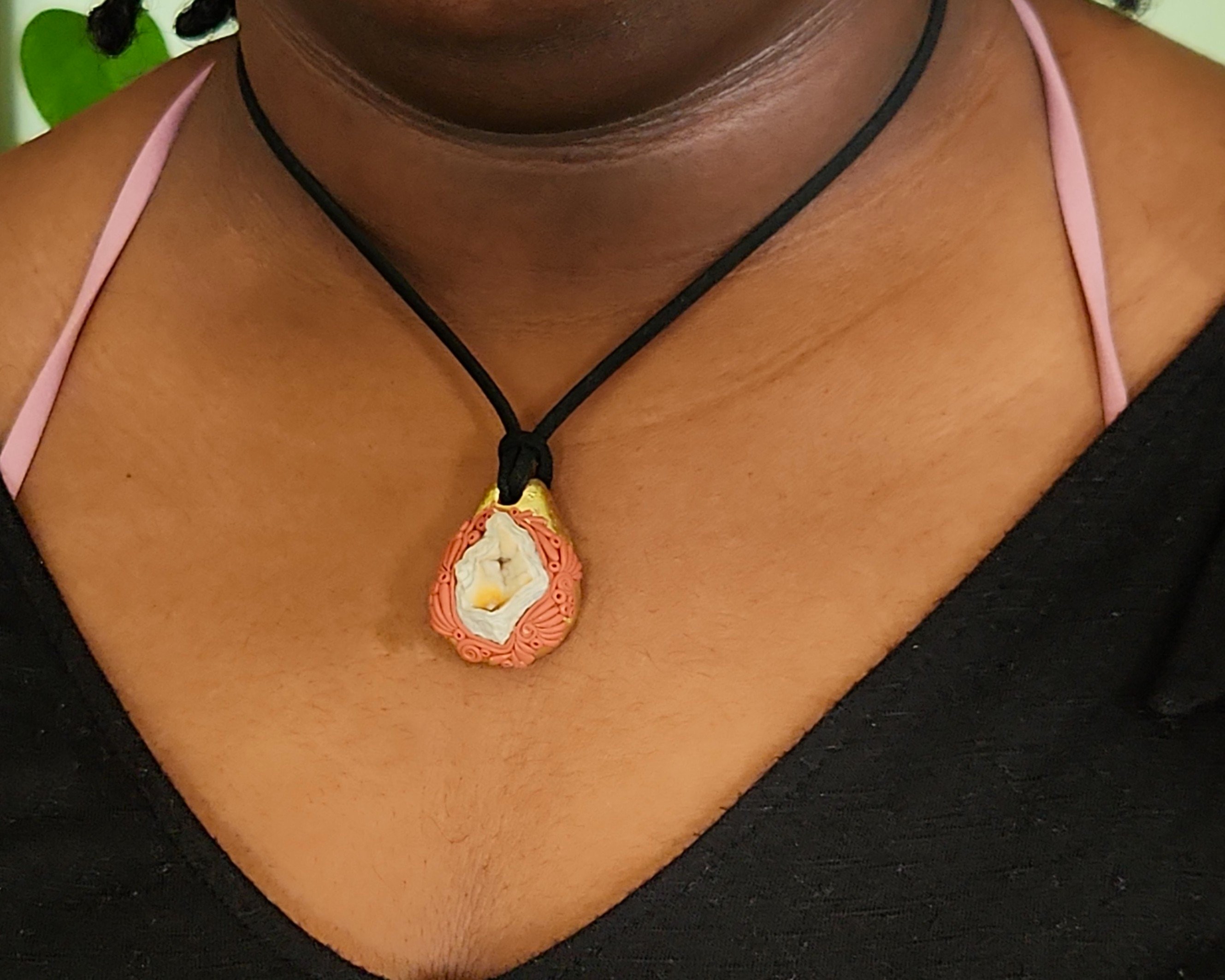 Pendant modeled by Vanessa Byrd. Pendant modeled by Vanessa Byrd.