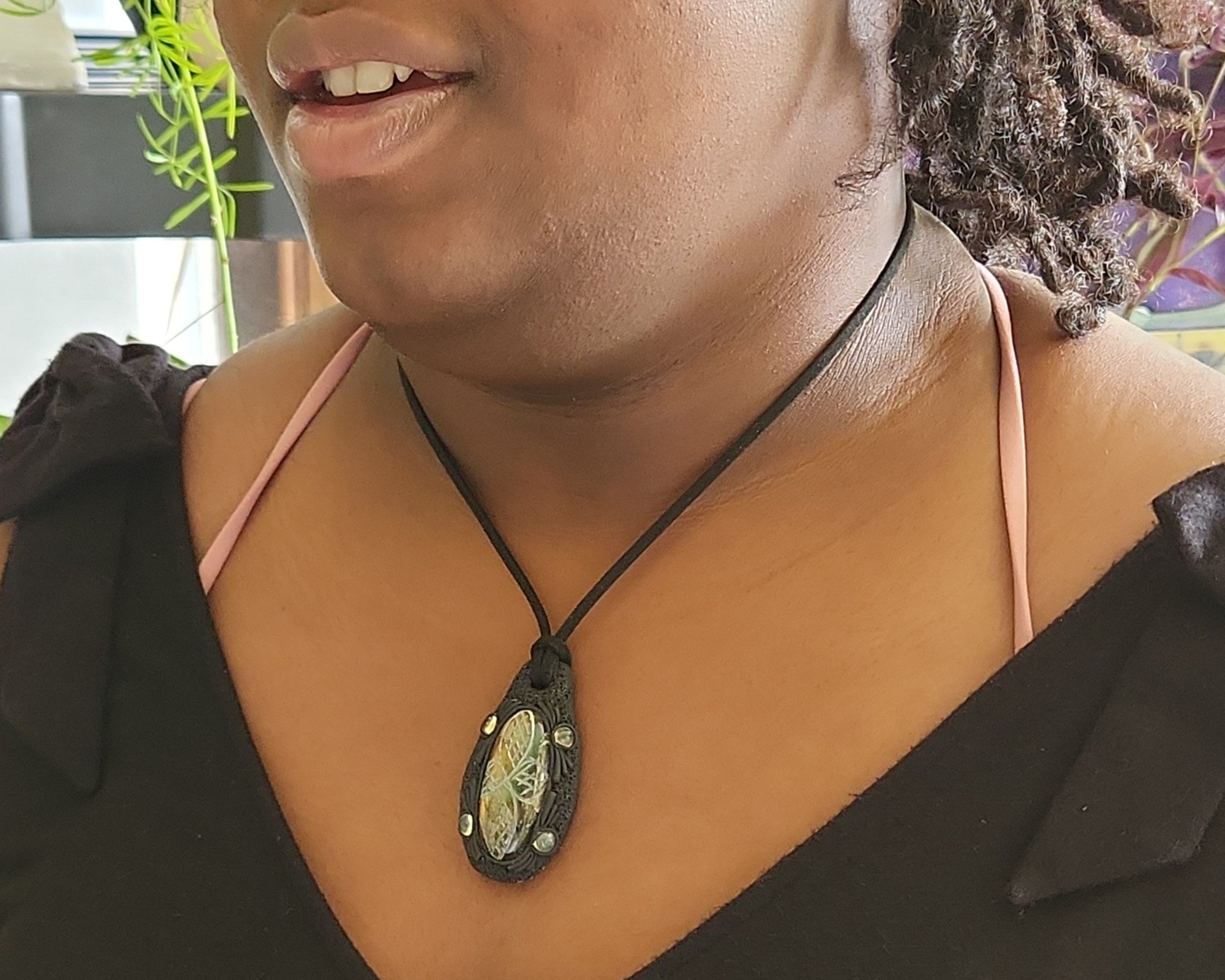 Pendant modeled by Vanessa Byrd. Pendant modeled by Vanessa Byrd.