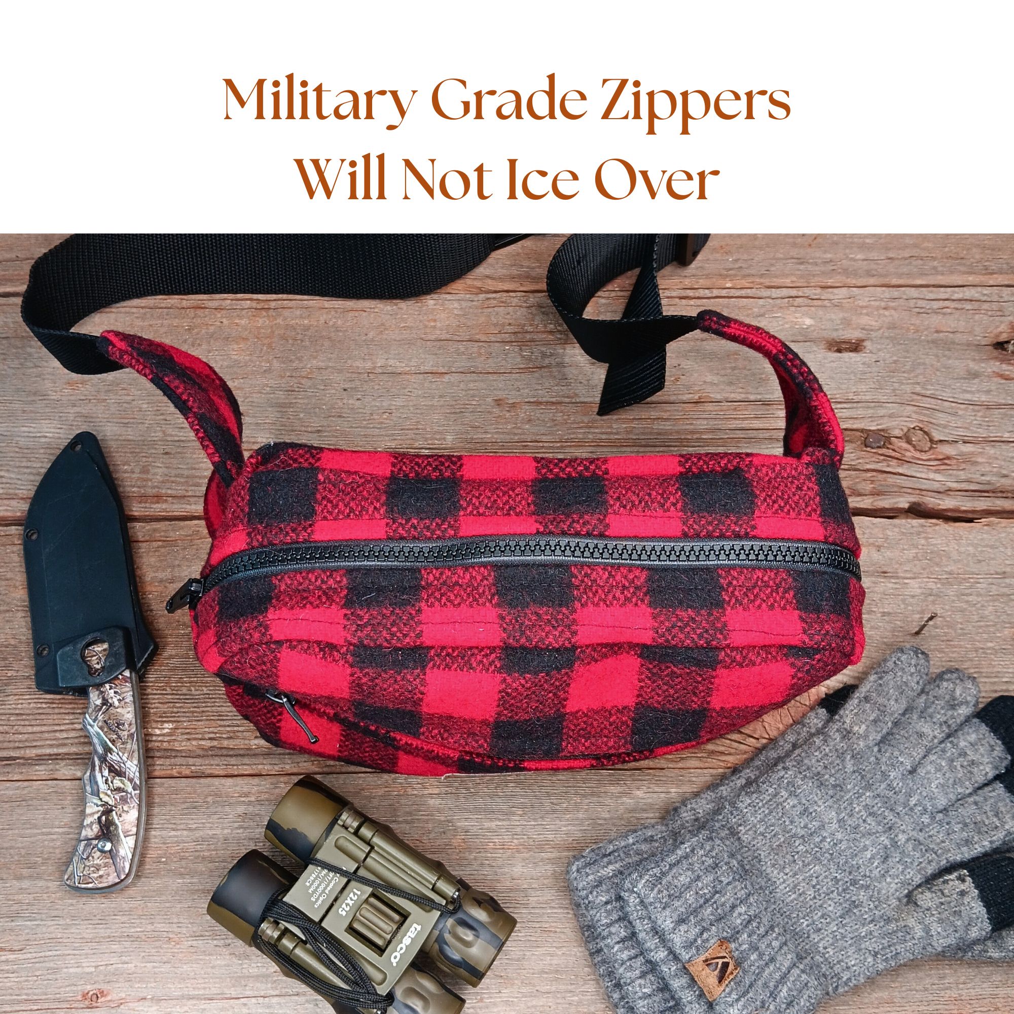 Close-up of handmade red wool belt bag with military-grade zipper rugged zippers that resist icing and withstands cold-weather conditions. Close-up of handmade red wool belt bag with military-grade zipper rugged zippers that resist icing and withstands cold-weather conditions.