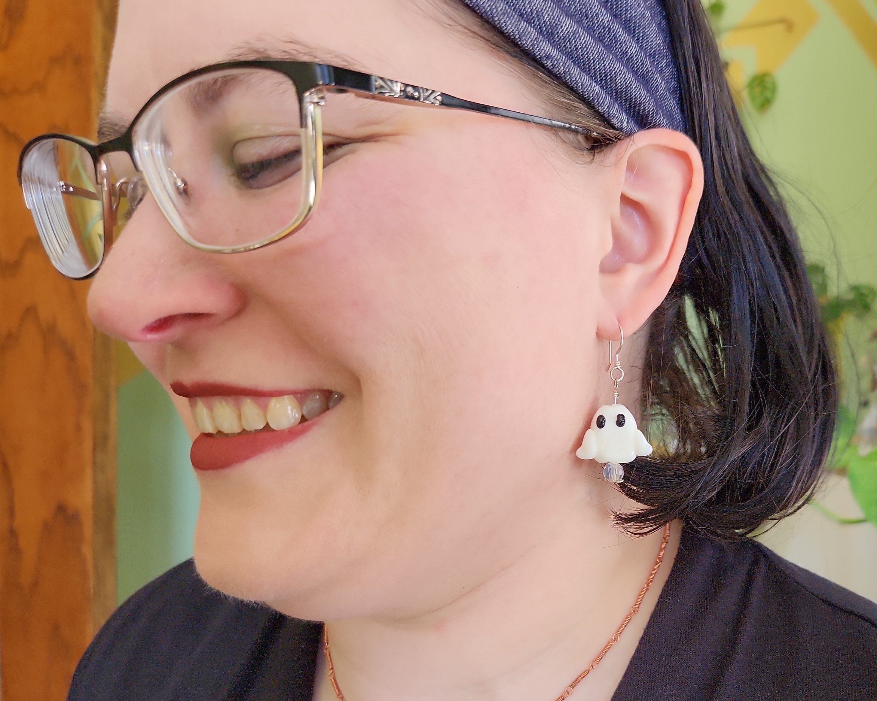 Earrings modeled by Joy Kizior Earrings modeled by Joy Kizior