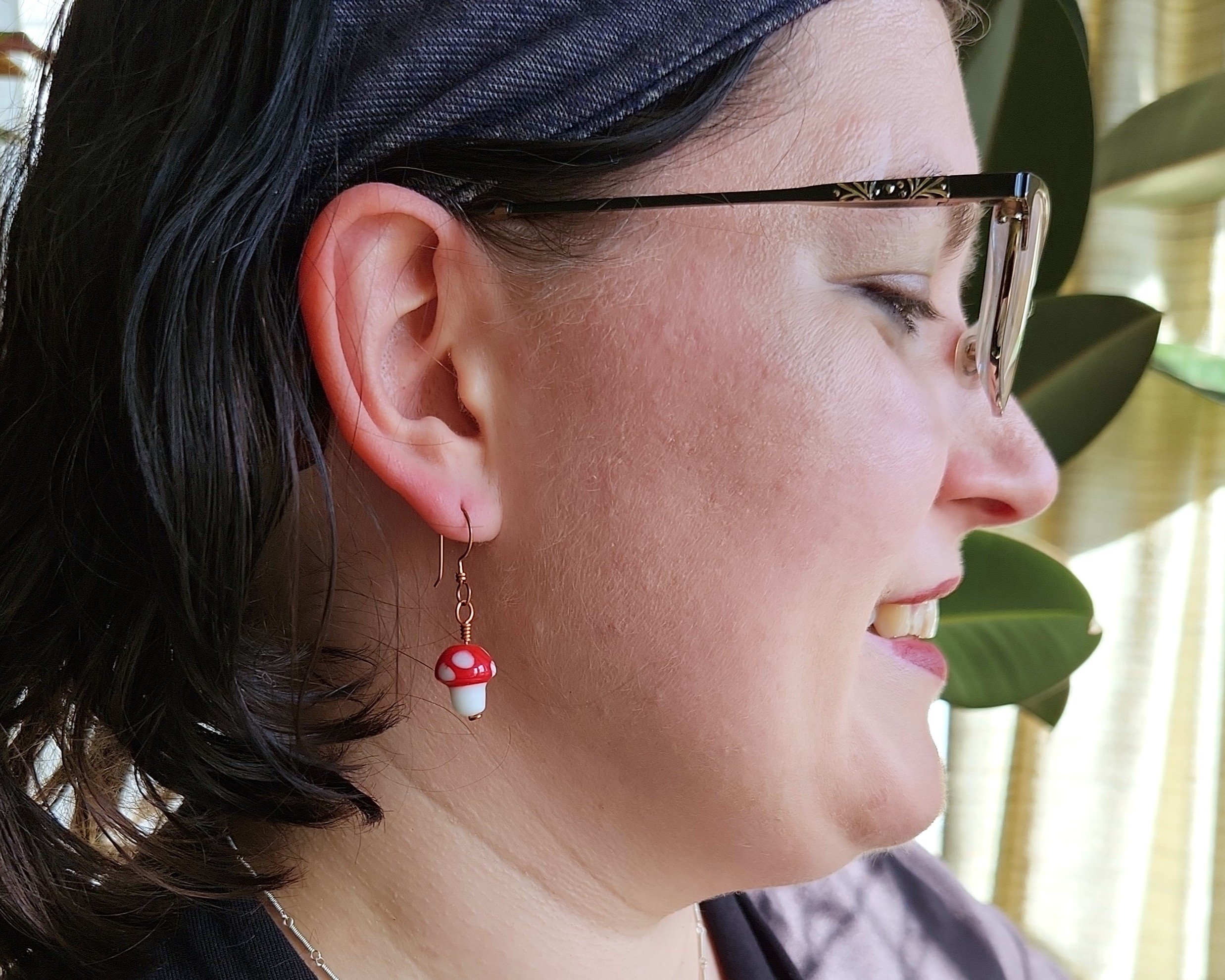 Earrings modeled by Joy Kizior Earrings modeled by Joy Kizior