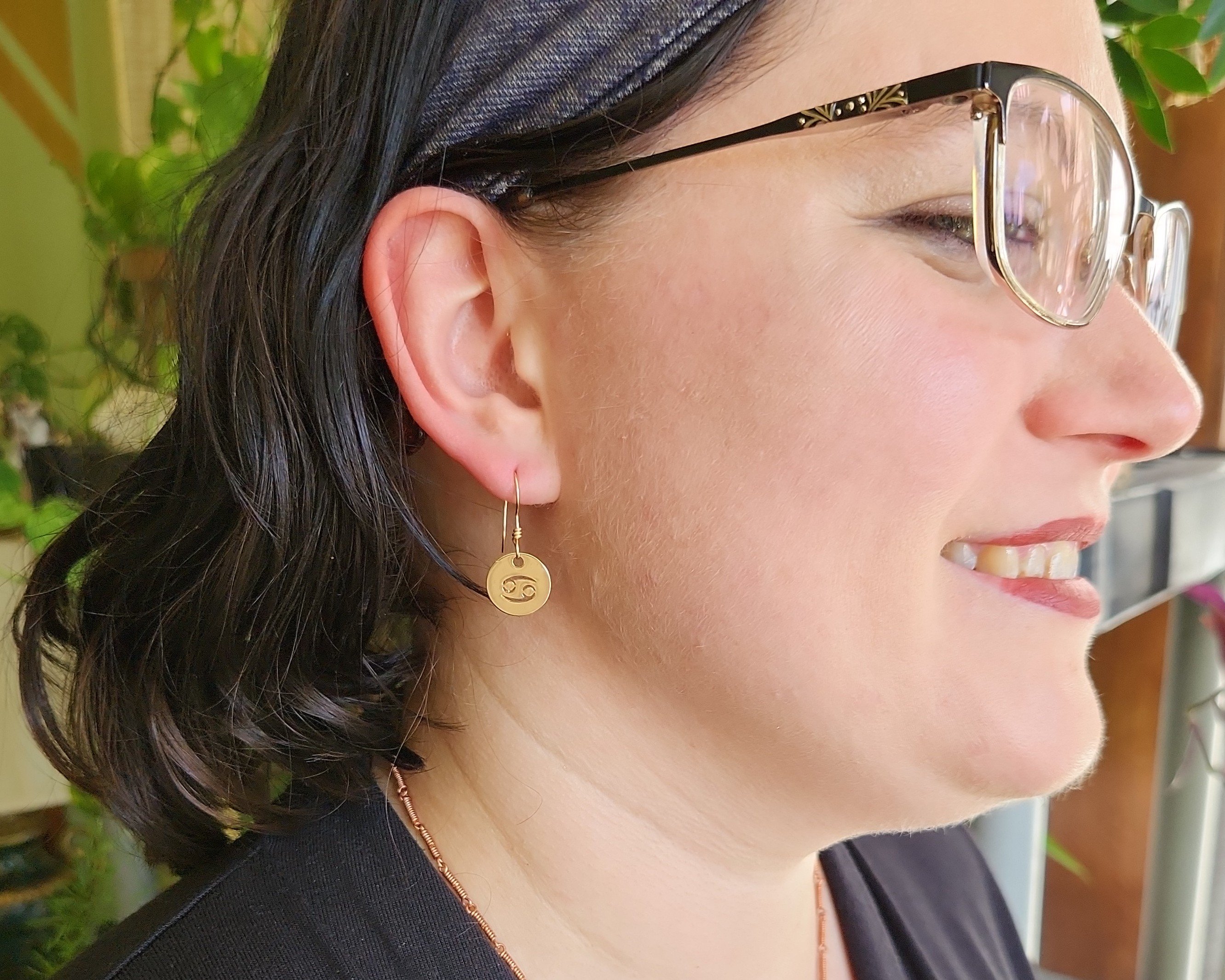 Earrings modeled by Joy Kizior Earrings modeled by Joy Kizior