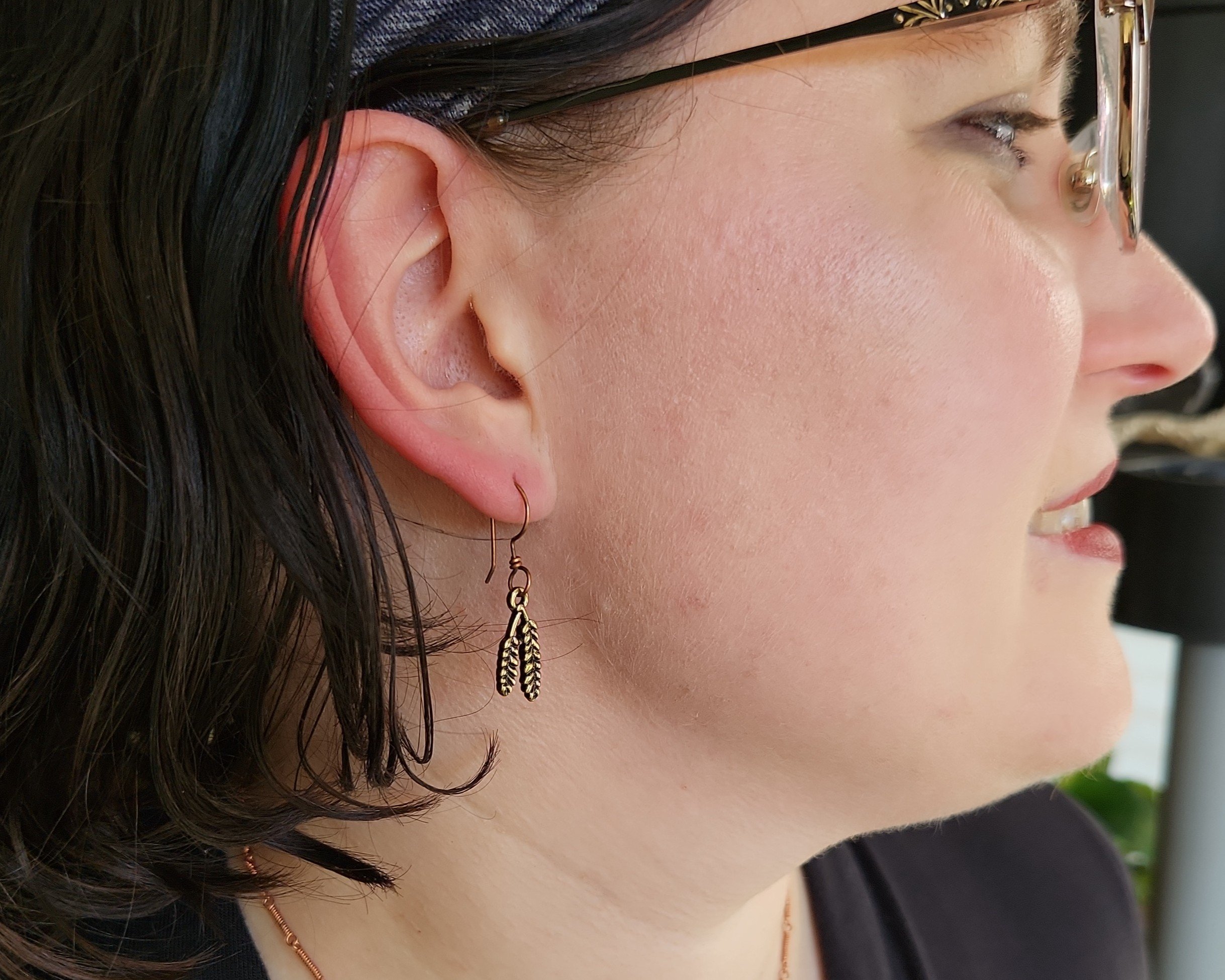 Earrings modeled by Joy Kizior Earrings modeled by Joy Kizior