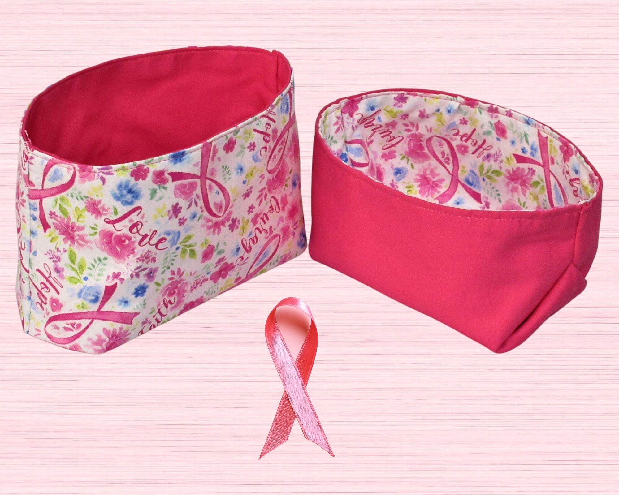 Pink ribbon caring gift set - 2 fabric baskets,  in pink ribbon, flowers, and words of hope pattern with a hot pink reverse.  In addition all products are reversible and support Breast cancer research.