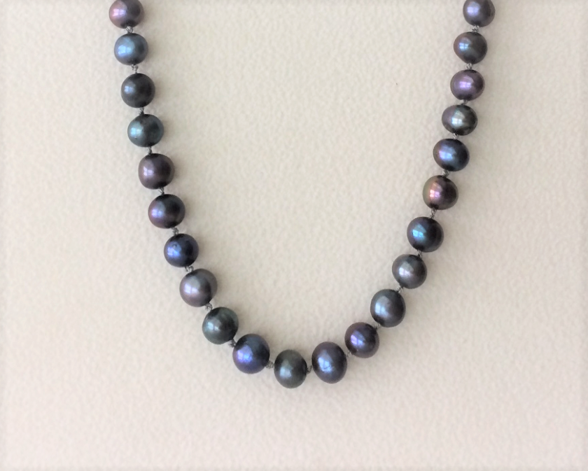Blue, green, and purple pearl necklace