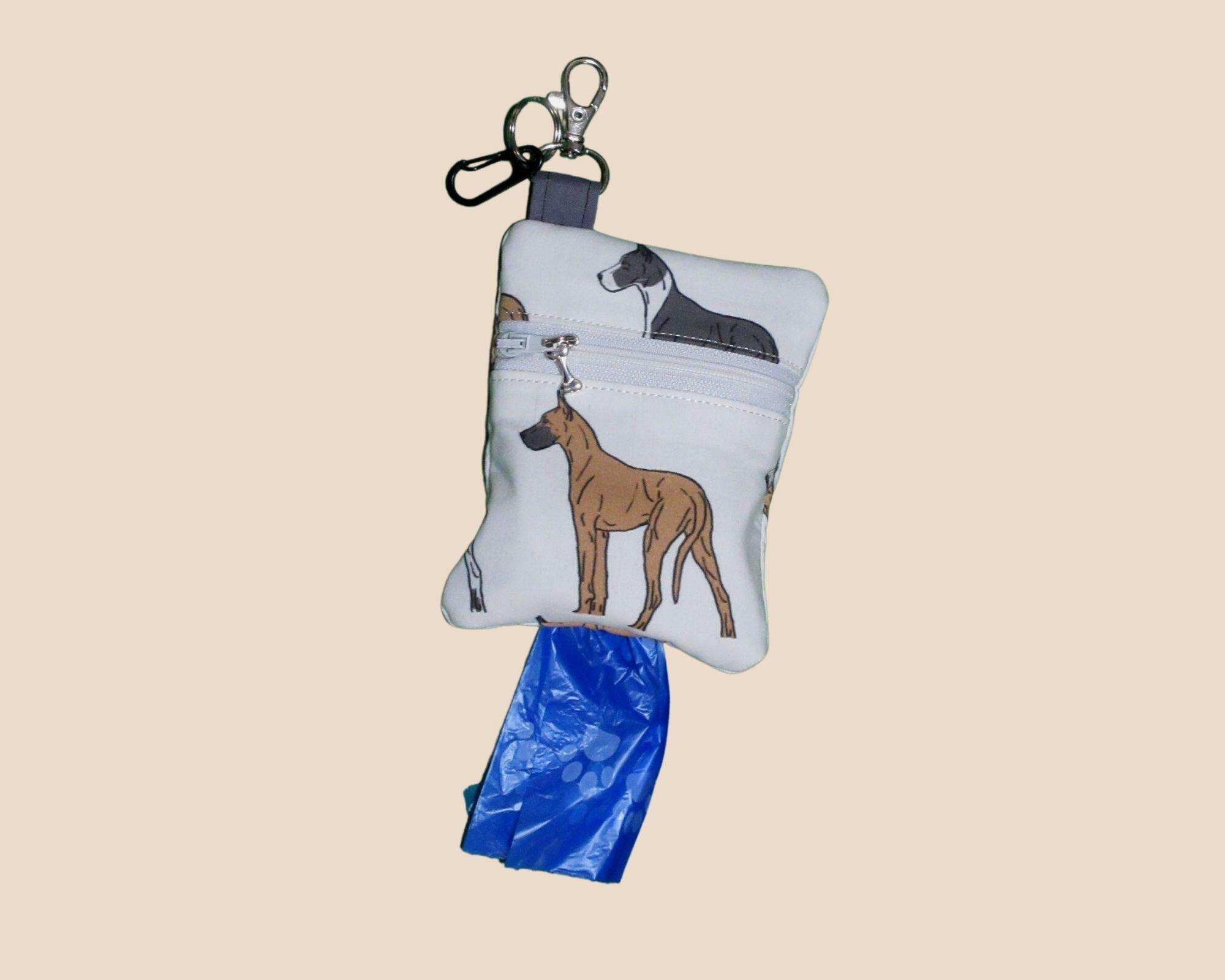 Know someone with a Great Dane?  They will need a Dog Poop Bag Holder.

A little larger than the standard dispenser - can hold a roll of big bags.
Showcases the various Dane shadings and is lined in quilt cotton.  Open with a zipper and clip to the leash.