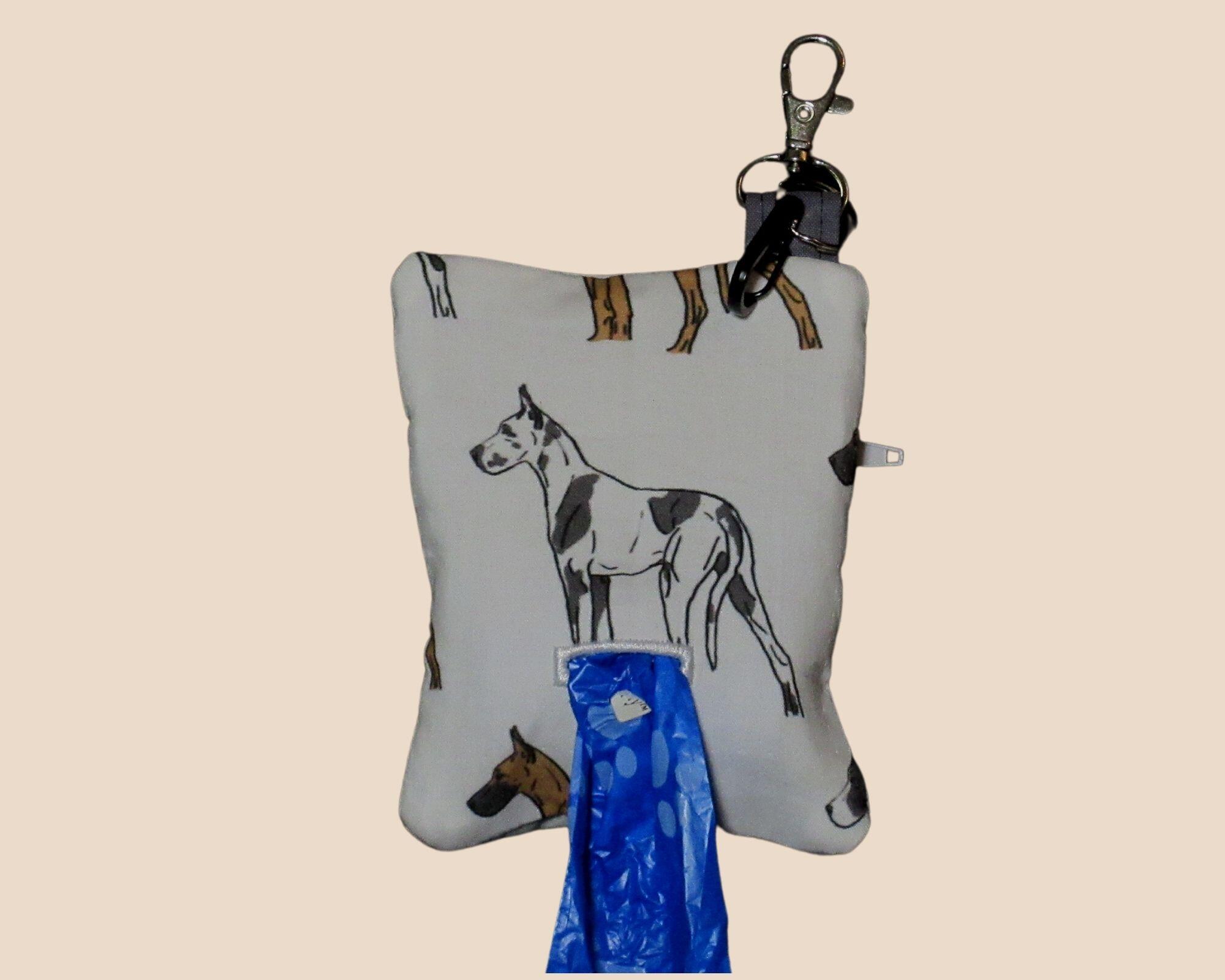 Know someone with a Great Dane?  They will need a Dog Poop Bag Holder.

A little larger than the standard dispenser - can hold a roll of big bags.
Showcases the various Dane shadings and is lined in quilt cotton.  Open with a zipper and clip to the leash.