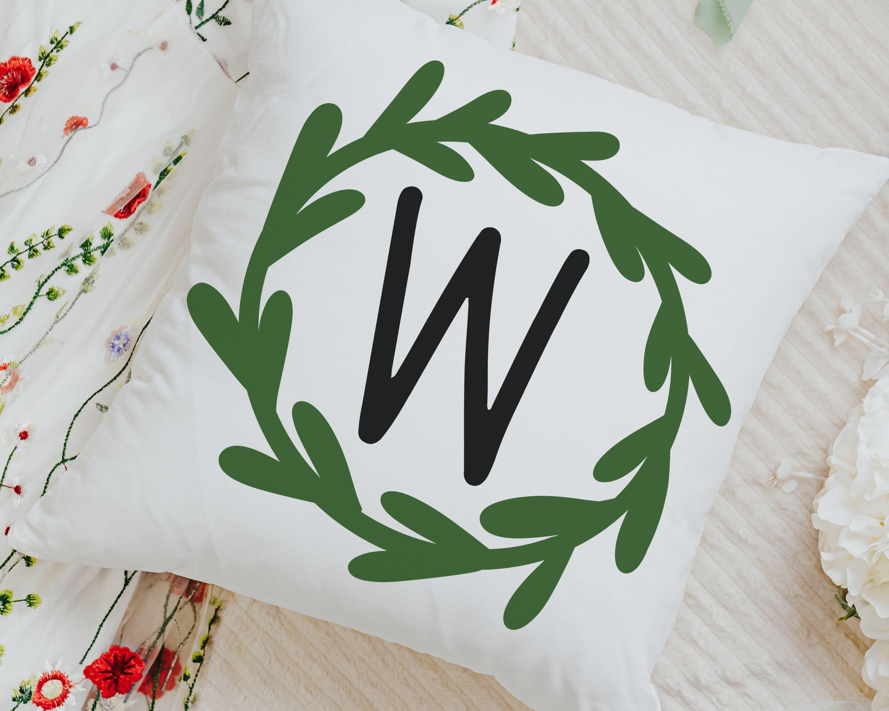 Personalized initial wreath throw pillow