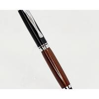This Oxford Roller Ball pen with the Chrome and Black components accentuate the Bolivian Rosewood body of this pen
