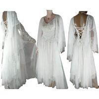 White sparkly wedding dress. Lace-up back and lots of sparkles. White sparkly wedding dress. Lace-up back and lots of sparkles.