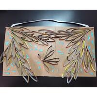 Handmade upcycled wall art titled, Behind the Curtain. A fairy is revealed behind a curtain of leaves. This photo is taken from the front. Handmade upcycled wall art titled, Behind the Curtain. A fairy is revealed behind a curtain of leaves. This photo is taken from the front.