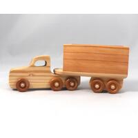 Handmade Wood Toy Tractor Trailer Truck from my Play Pal Collection, crafted using traditional woodworking techniques. Made from smooth-sanded wood, meticulously assembled, and finished with clear dewaxed shellac.