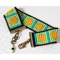 Green and orange seed bead bracelet. Green and orange seed bead bracelet.