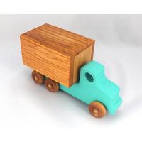 This handmade wooden toy truck is a box truck or moving van, painted in your choice of several colors. The wheels and body of the truck are finished with shellac.