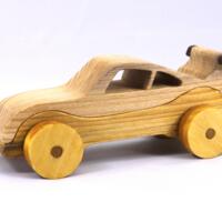 Handmade wooden toy car coupe finished with nontoxic clear, amber shellac and contrasting wood trim. It's one of ten cars in my Speedy Wheels Collection. Handmade wooden toy car coupe finished with nontoxic clear, amber shellac and contrasting wood trim. It's one of ten cars in my Speedy Wheels Collection.