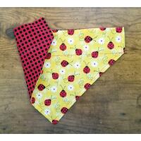 Over the Collar Reversible dog bandana lady bugs and black polka dots on red on the other Over the Collar Reversible dog bandana lady bugs and black polka dots on red on the other