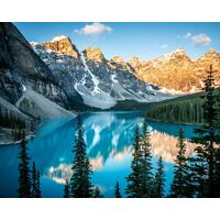 Beautiful Moraine Lake at sunrise, with alpenglow hitting the peaks. Banff National Park, Canada.
