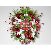 Festive Merry Christmas wreath featuring a plaid ornament centerpiece, vibrant red berries, white mesh ribbons, and lush greenery. Festive Merry Christmas wreath featuring a plaid ornament centerpiece, vibrant red berries, white mesh ribbons, and lush greenery.