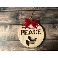 Handcrafted Peace Ornament cut from maple. Red velvety bow added. This ornament comes in a nice little giftbox with a clear window. 