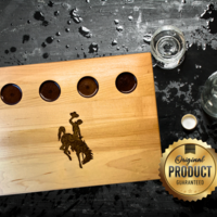 12X9-in. maple hardwood shot glass flight board featuring the Wyoming Cowboy logo in brown and gold resin. Perfect for bars, gifts, decor!