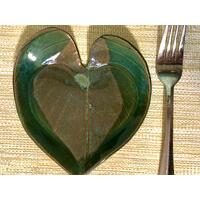 6x6" heart shaped plate with Hosta plant texture. Glazed with a dark green rim and a mixture of blue and grey throughout the middle.  6x6" heart shaped plate with Hosta plant texture. Glazed with a dark green rim and a mixture of blue and grey throughout the middle.