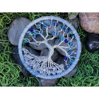 stunning 3 inch tree of life featuring clear glass and a variety of blue glass beads attached to blue yarn wrapped hoop stunning 3 inch tree of life featuring clear glass and a variety of blue glass beads attached to blue yarn wrapped hoop