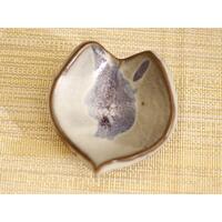 Ceramic heart shaped spoon rest. Glazed in grayish blue and purple colors. Approximately 3"x3.5" Ceramic heart shaped spoon rest. Glazed in grayish blue and purple colors. Approximately 3"x3.5"