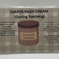 Homemade diaper rash cream recipe for teething babies, laminated card with cream and white plaid background  Homemade diaper rash cream recipe for teething babies, laminated card with cream and white plaid background