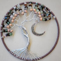 This is a close up front view of the night breeze tree of life wall hanging