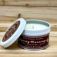 Lilac scented soy candle in 6oz tin with lid off.