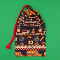 This fun game bag is closed with a nice red cord and toggle. This fun game bag is closed with a nice red cord and toggle.