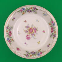 A pretty china dish for holding your jewelry.