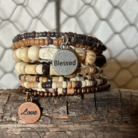 Boho wood bead bracelet with statement charms, it’s pretty and eye-catching bracelet to wear. It wraps around your wrist about nine times.