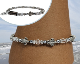 Bendi's Magnetic bracelet with clear crystals baby sea turtles and hematite