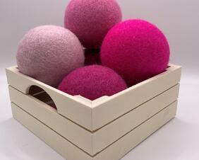 Pink dryer balls in box