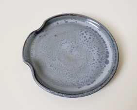 light blue pottery spoon rest