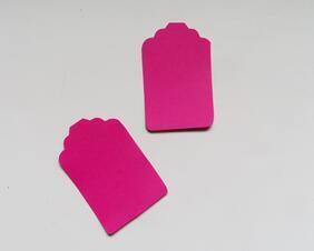 Dark pink blank tags to use for gift tags, favors, labeling, etc.  Can come unpunched, punched, or pre-strung with white string.   Tags measure 2 3/4" x 1 7/8"