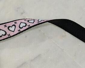 1 inch wide pink and black dog leash with hearts