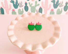 fireflyFrippery Cute Cactus Stud Earrings on Pink Display Stand