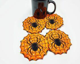 Protect your table with these handy and colorful spiderweb with spider fabric coaster.

    What you get: One set of 4 machine embroidered spider and web glow in the dark coasters.

    Fabric color:  Halloween orange with glow in the dark stars, with a black embroidered spiderweb and spider on front with a variegated black, orange and white finished around the outer edge. Reverse is the same fabric.

    Fabrics used:  Two layers of 100% cotton fabric, lined with a layer of polyester batting--all preshrunk.

    Size:  5 inches in diameter.

    Care: Hand or machine wash in cold water with like colors.  Air dry. No bleach.

NOTE:  Do not iron or dry in a hot dryer, this will take the glow in the star's ability to glow any longer.

Coffee cup not included with this listing, for display only.

Last picture show the stars glowing in the dark.