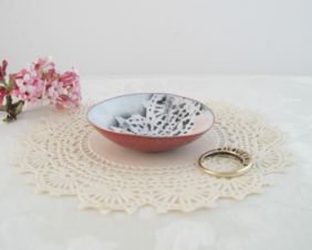 tiny copper enameled trinket dish pink hearts and charcoal gray stenciled lacy design on white background