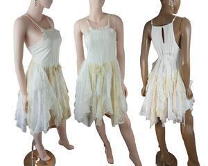 Knee length cream and white tattered dress.
Adjustable shoulder straps, very cute.
