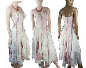Pink, red and white tattered hippy style dress. Side laces for snug fit and lots of lace and net fabric tatters in the full length skirt. One of a kind, handmade, eco-friendly, bohemian style clothes.