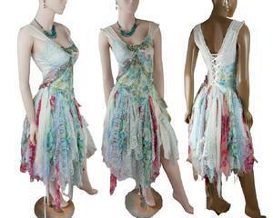 Multi colored bohemian style dress, just below the knee length. Lace up back and bling on the front. One of a kind, handmade, eco-friendly, bohemian style clothes.