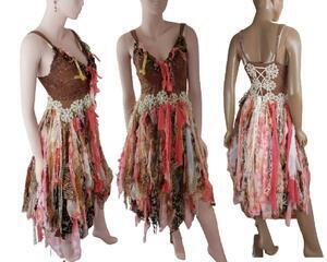 Brown and peach with cream bohemian tattered cowgirl style event dress. Lace up back for a snug fit. Lots of beads on the front with crochet.
One of a kind, hand made, eco-friendly boho style dress.